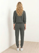 Unisex half-zip pullover and sweatpants set in relaxed fit and soft fabric for everyday comfort