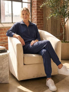 Unisex half-zip pullover and matching sweatpants set in soft fabric for casual comfort and relaxed fit