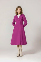 Water-repellent A-line hooded raincoat for women with flattering belt and insulated lining in vibrant purple