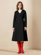 Water-repellent A-line hooded raincoat with feminine fit and insulated lining for warmth and comfort