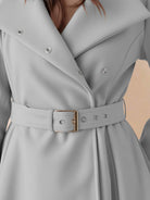 Water-repellent A-line hooded raincoat with matching belt and insulated lining for women