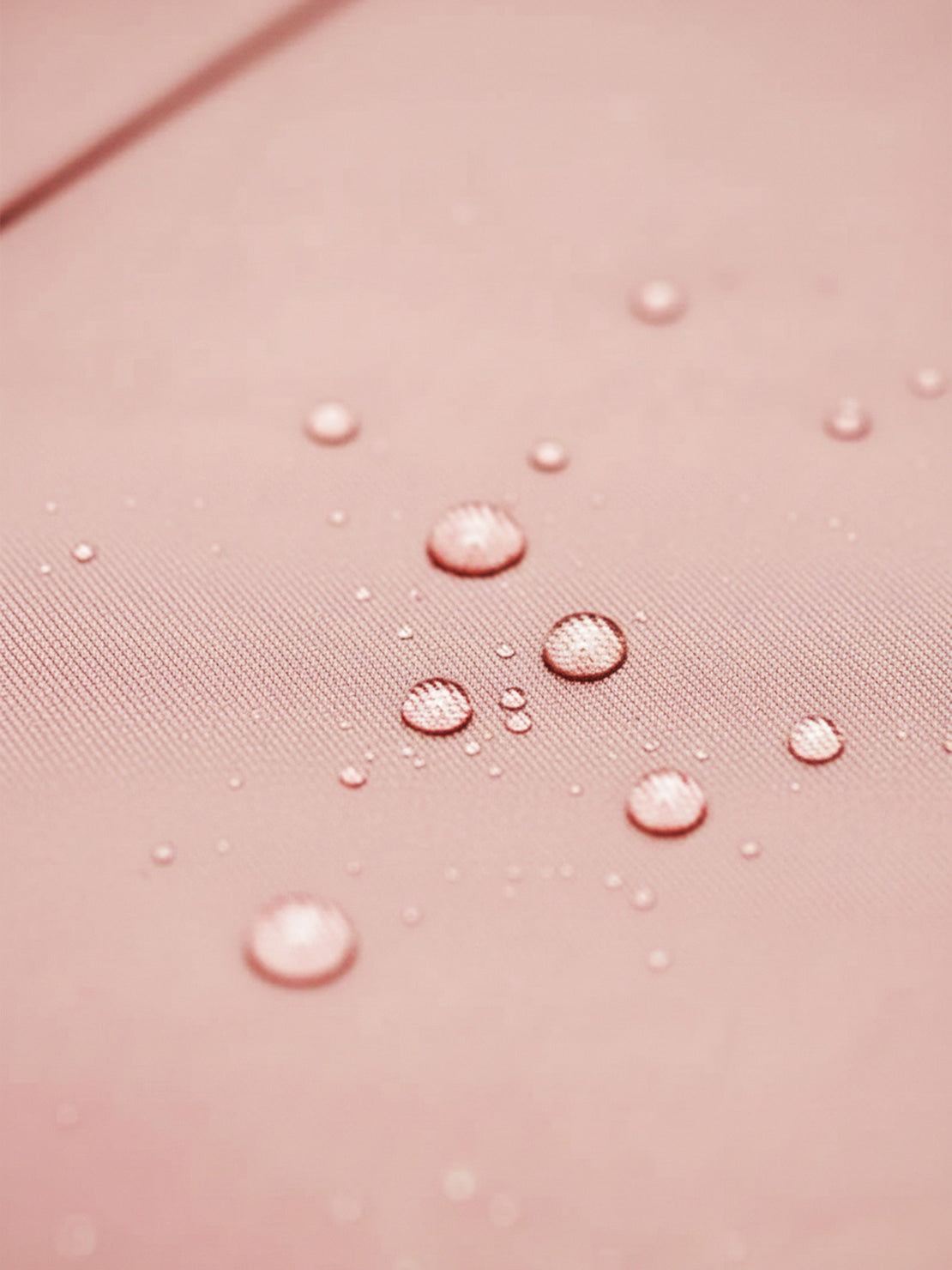 Water-repellent A-line hooded women's raincoat with matching belt and insulated lining