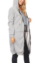 Woman wearing oversized long zip sweatshirt hoodie in grey with hood and fleece lining